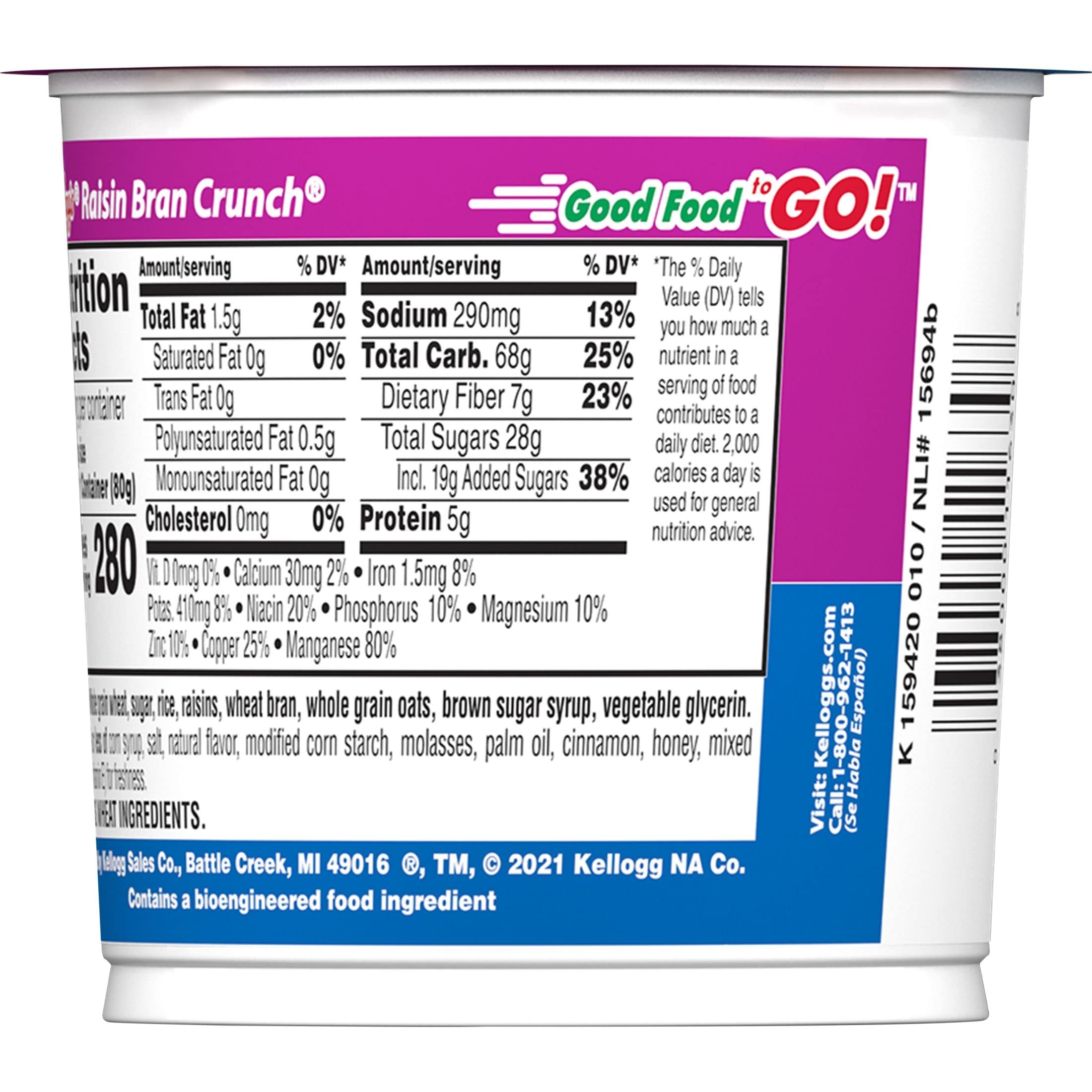 Kellogg's Raisin Bran Crunch cup open, ready to pour milk for a quick breakfast.