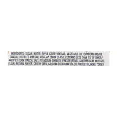 Ken's Sweet Vidalia Onion Dressing on a salad bowl, enhancing flavor.