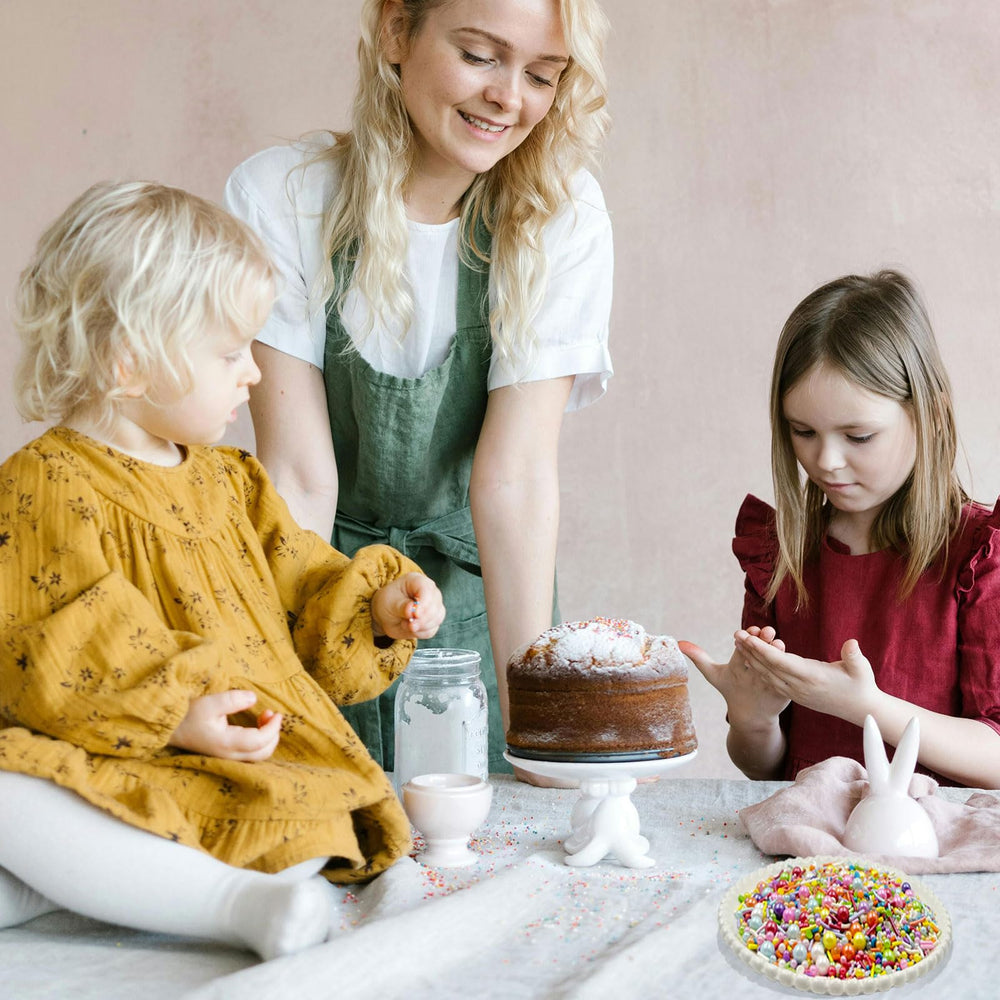 Kercky rainbow sprinkles on brownies adding color.