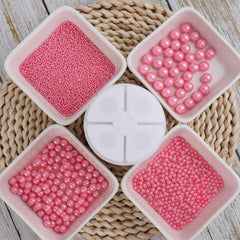 Kercky pink pearl sprinkles on cookies for charming finishing touch.