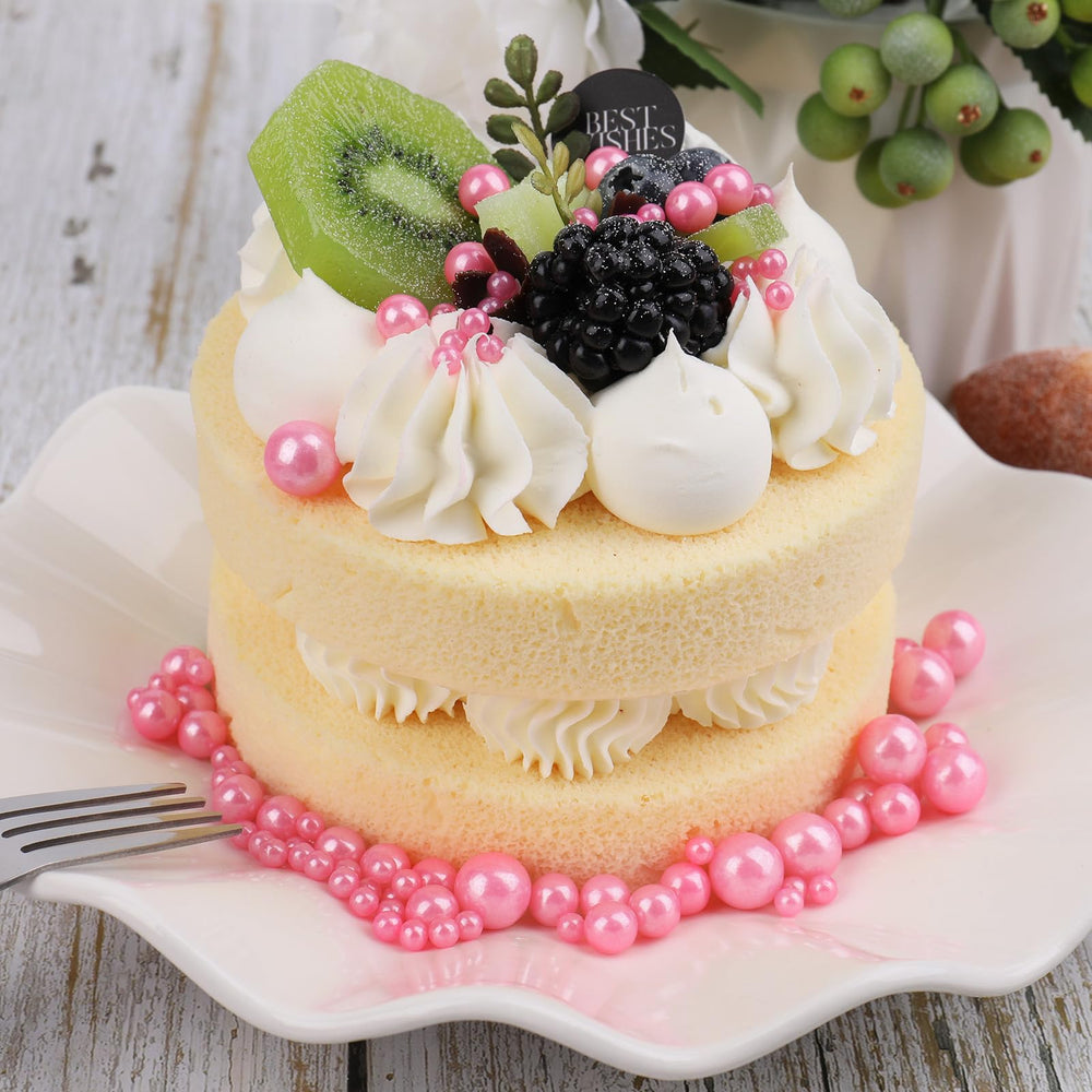 Kercky pink pearl sprinkles on cupcakes create a festive look.
