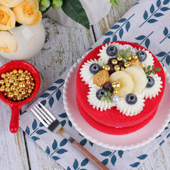 Kercky sprinkles atop a cake and cupcake for luxurious texture and shine.