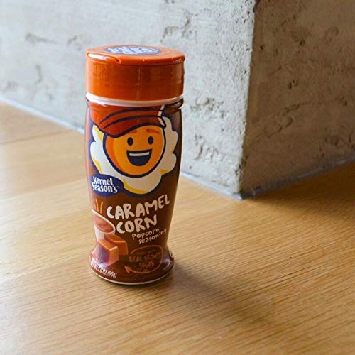 Kernel Season's caramel popcorn seasoning jar dispenses evenly for easy coating.