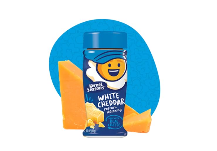Kernel Season's popcorn seasoning bottle close-up, highlighting creamy cheese notes for tasty snacking.