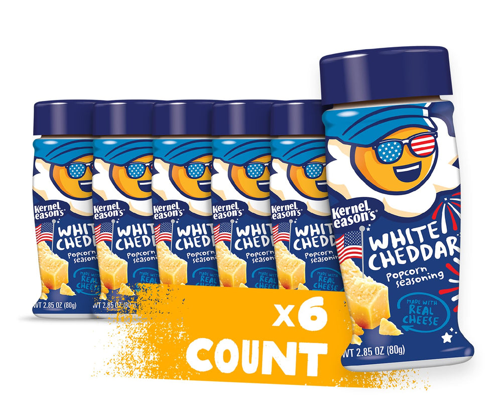 Kernel Season's White Cheddar seasoning jar close-up adds bold real-cheese flavor to popcorn.