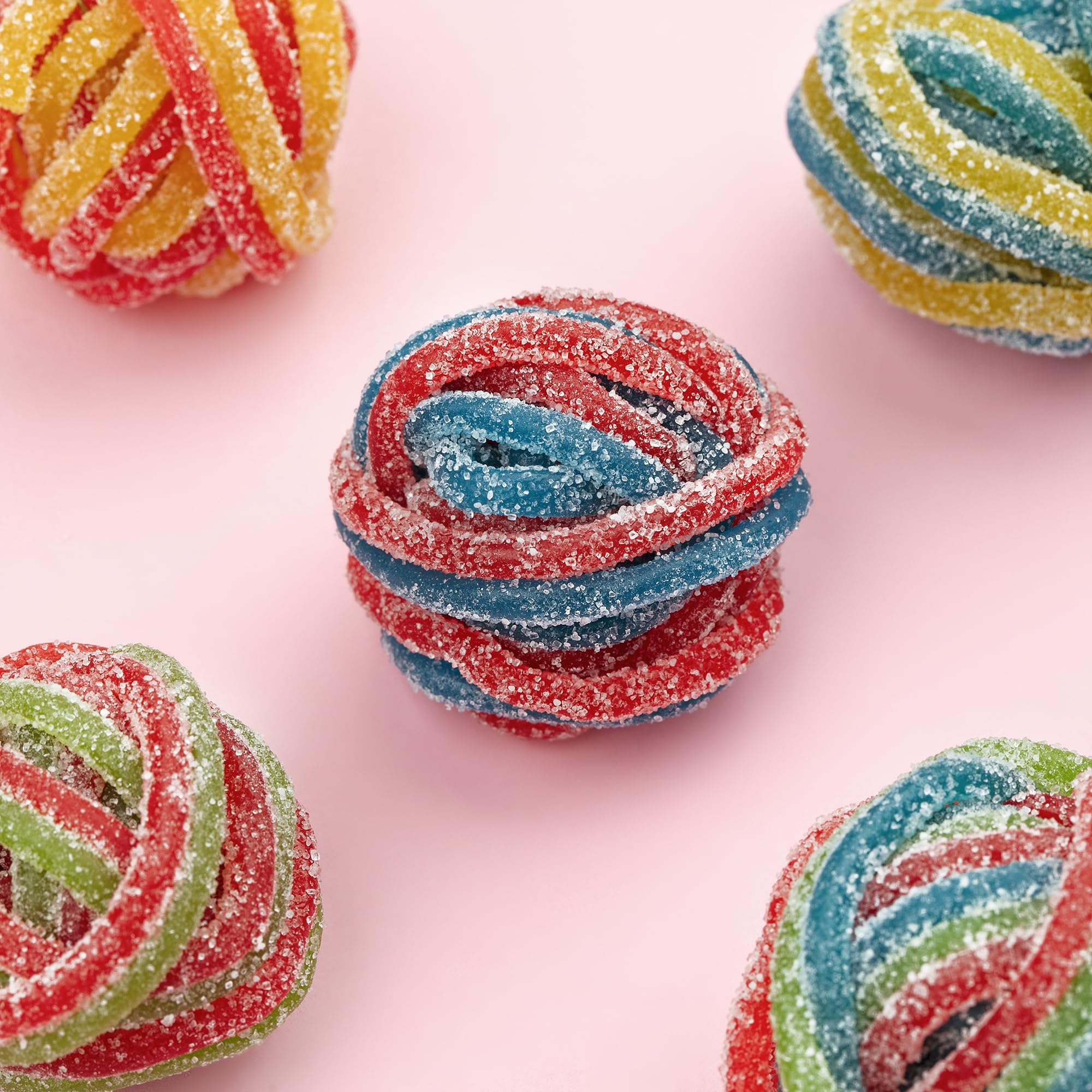 Kervan Bebeto Rainbow Laces displayed at a dessert table for a colorful buffet.
