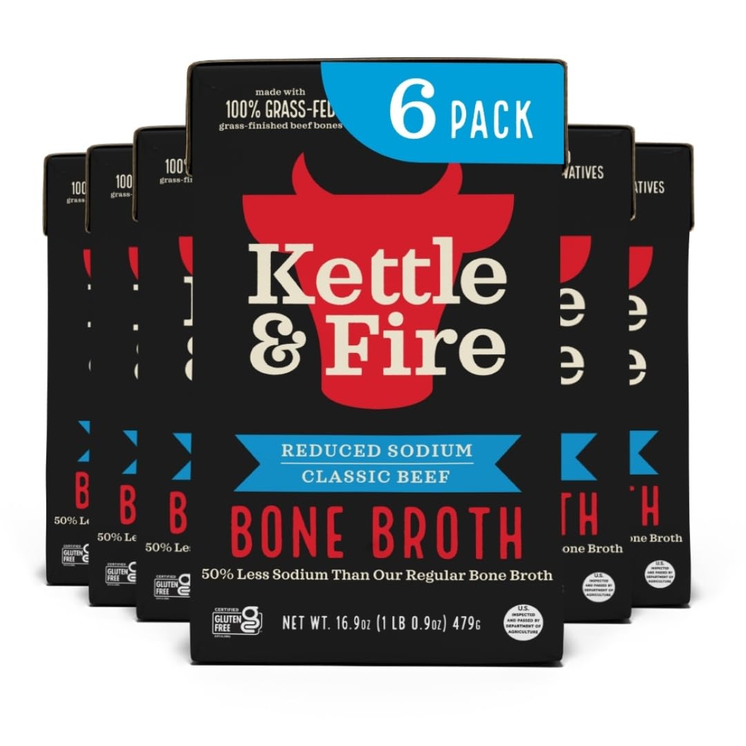 Kettle & Fire Reduce Sodium Beef Bone Broth bottle poured for quick meals.