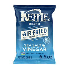 Kettle Brand air fried sea salt vinegar chip closeup showing light, crispy texture.