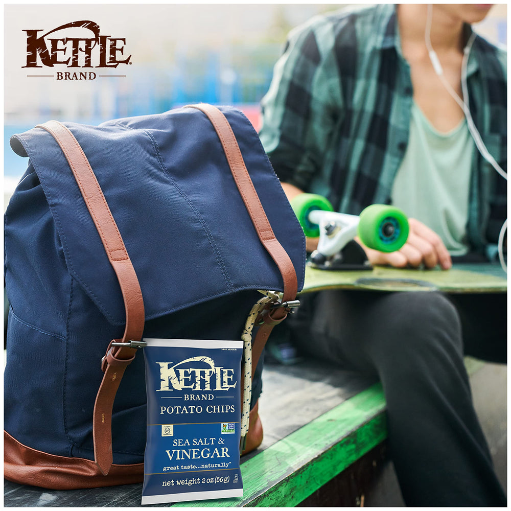 Kettle Brand Salt & Vinegar bag displayed on store shelf