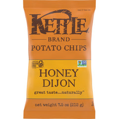 Kettle Brand Honey Dijon bag close-up highlighting premium potatoes and flavor.