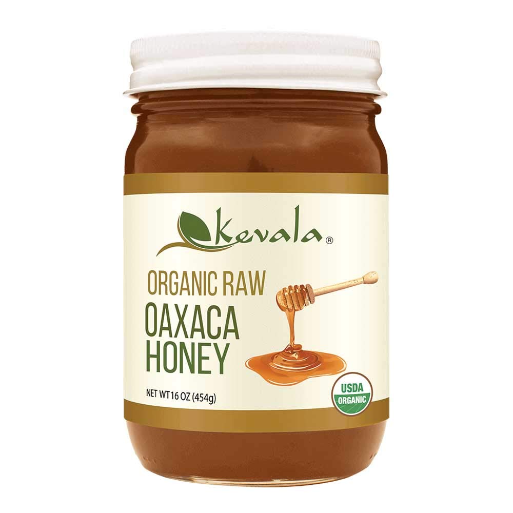 Kevala Oaxaca honey bottle pouring over pancakes for natural sweetness.