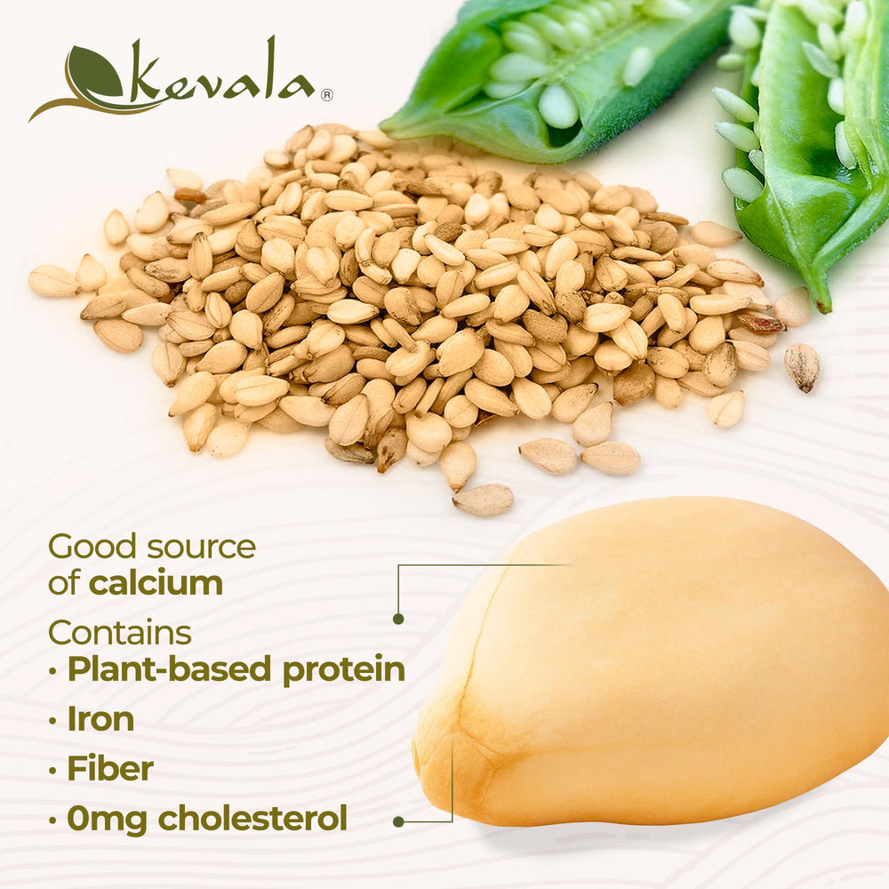 Kevala sesame seeds on salad dressing, adding crunch and nutty depth.