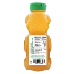 Kevala honey bottle top view shows golden, unfiltered nectar.