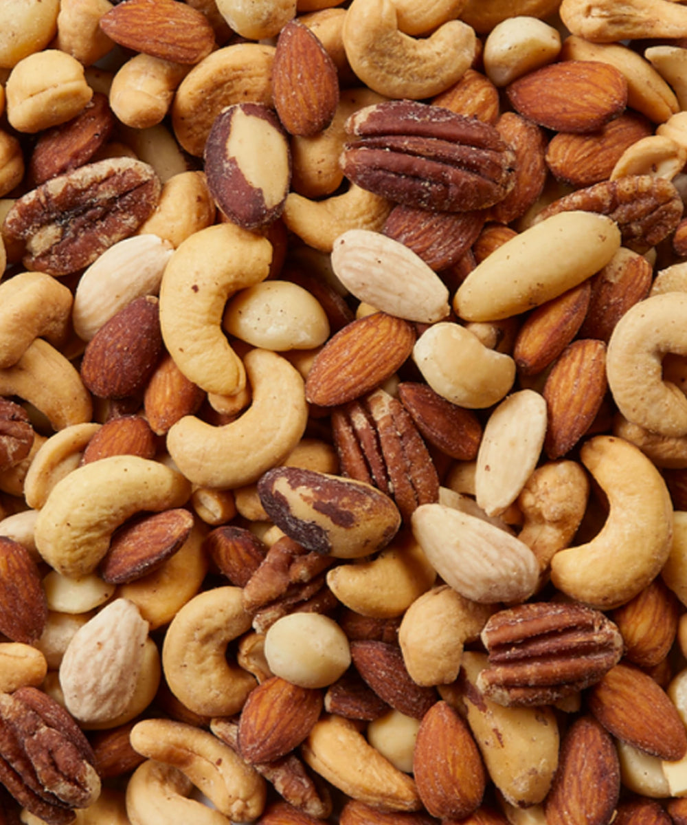 KEV&COOPER mixed nuts arranged on a serving board for entertaining