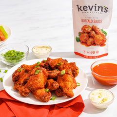 Kevin's Natural Foods Buffalo Sauce label close-up highlights clean ingredients.