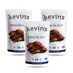 Kevin's Natural Foods Korean BBQ Sauce bottle highlights gluten-free, paleo-friendly dinner enhancement.