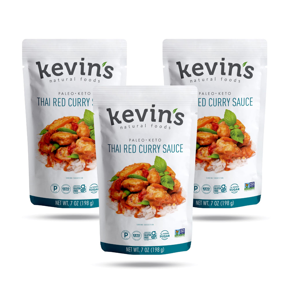 Kevin's Thai Red Curry Sauce bottle front showing vibrant ready-to-use flavor.
