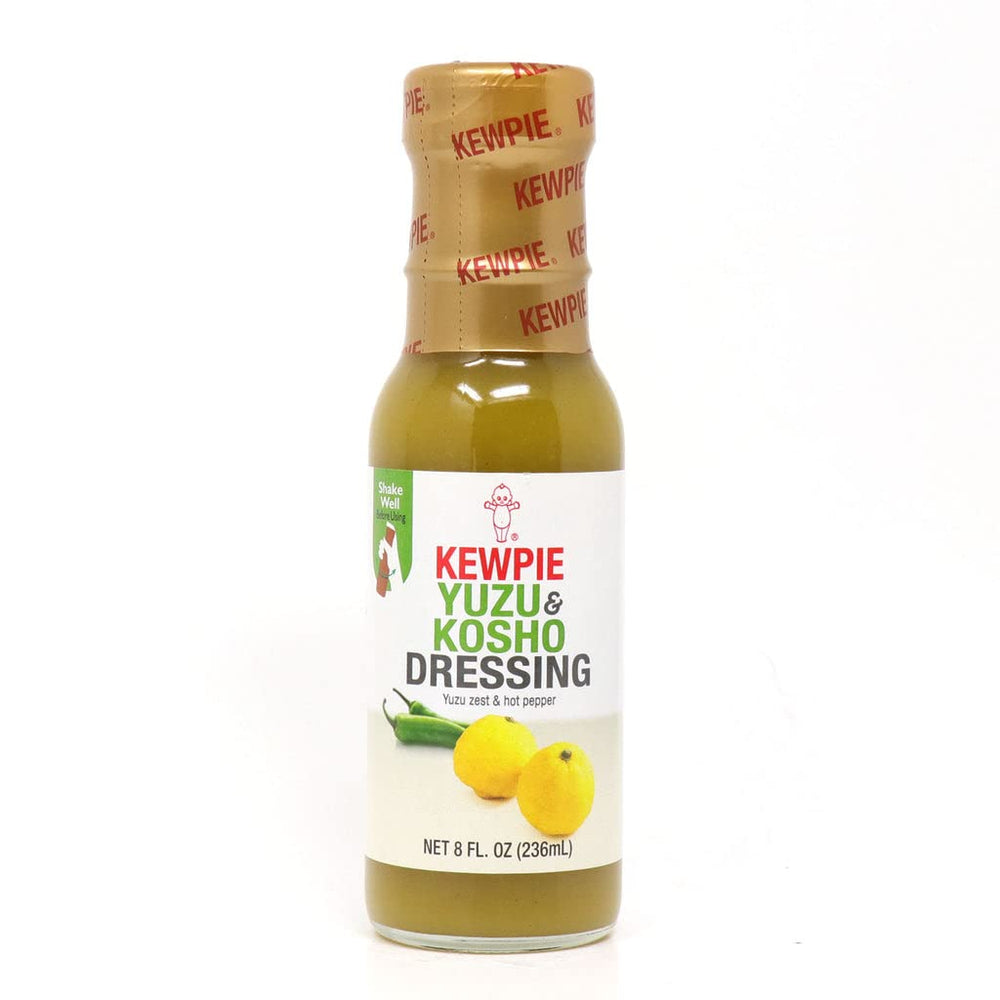 Kewpie Yuzu Kosho Dressing 8oz bottle on counter, zesty flavor boost for salads.