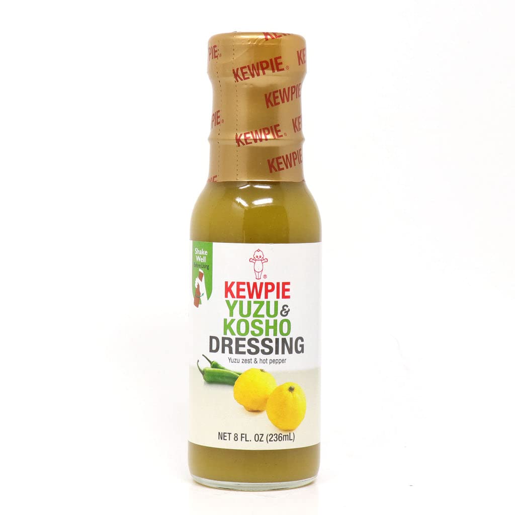 Kewpie Yuzu Kosho Dressing 8oz bottle on counter, zesty flavor boost for salads.