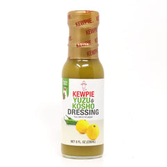 Kewpie Yuzu Kosho Dressing 8oz bottle on counter, zesty flavor boost for salads.