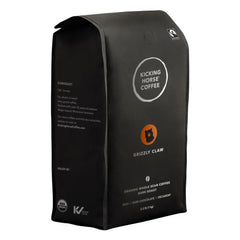 Kicking Horse Grizzly Claw coffee beans in a bag for home brewing versatility.