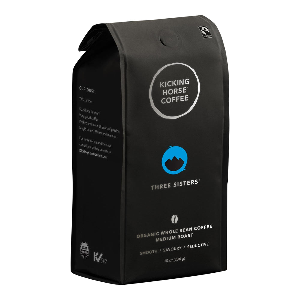Kicking Horse Three Sisters coffee beans close-up for a balanced morning brew.