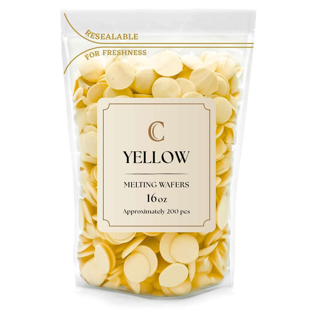 KIDU Merckens melting wafers in yellow bulk bag for smooth dipping and glossy coatings.