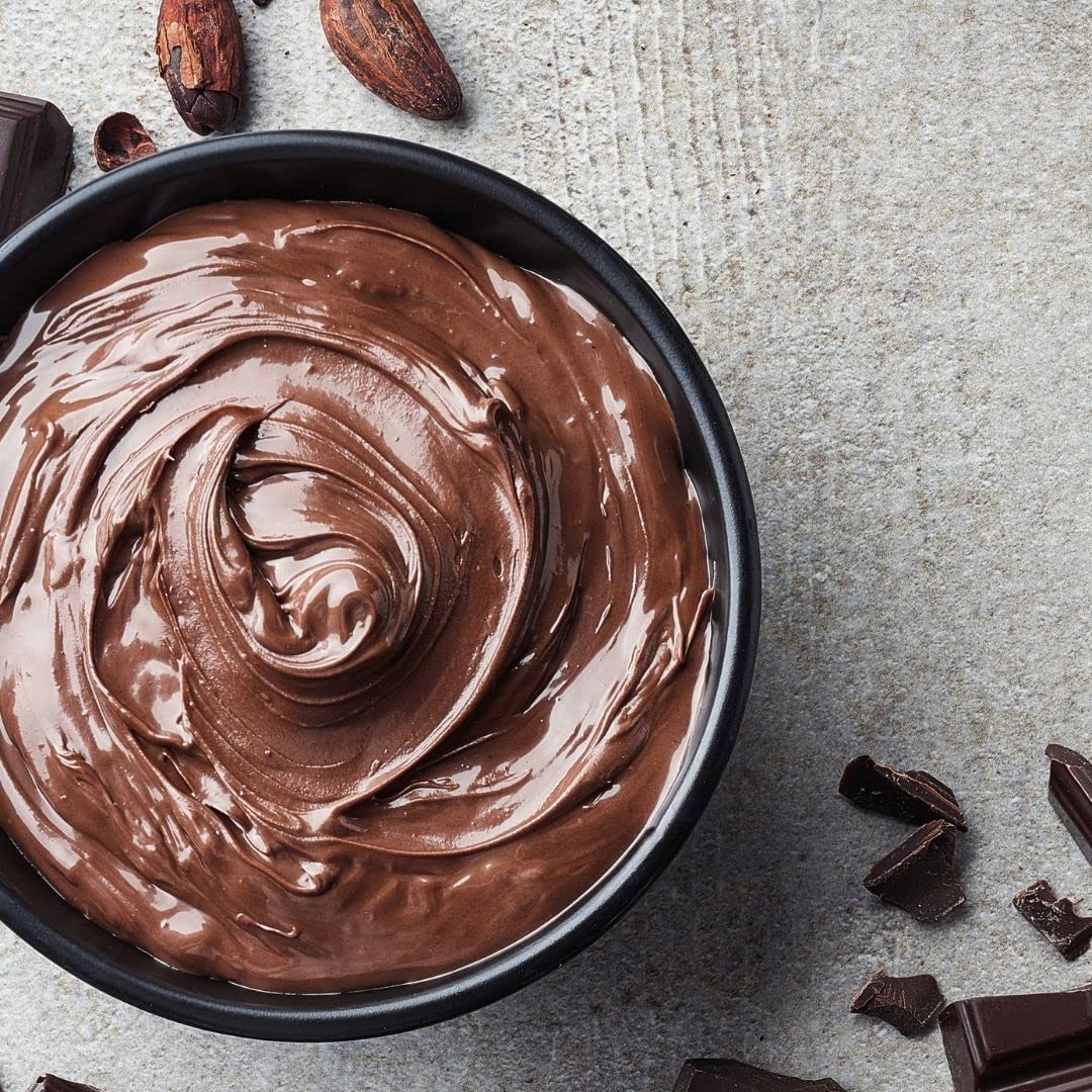 KIDU Merckens dark chocolate wafers tempered for a glossy finish.
