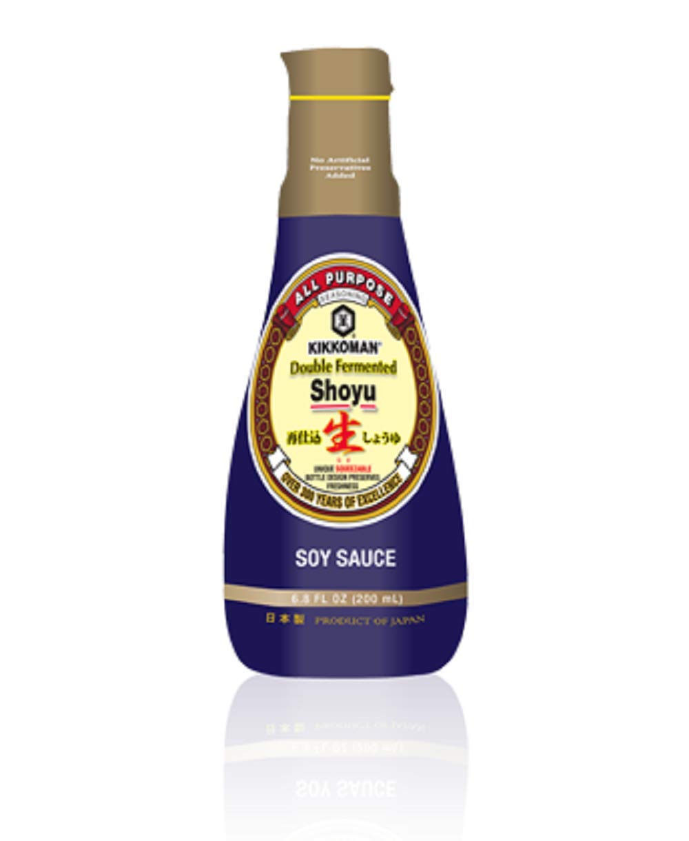 Kikkoman Double Fermented Soy Sauce bottle pour enhances sashimi and umami.