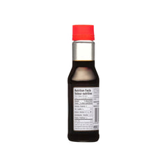 Kikkoman label-closeup highlights natural brewing method for authentic soy sauce.