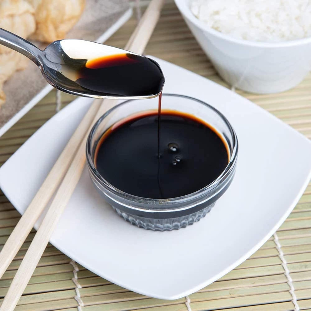 Kikkoman Lite Soy Sauce in a kitchen setup signals everyday cooking versatility