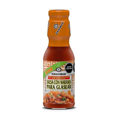 Kikkoman Orange Sauce bottle closeup for versatile glaze and dipping options.