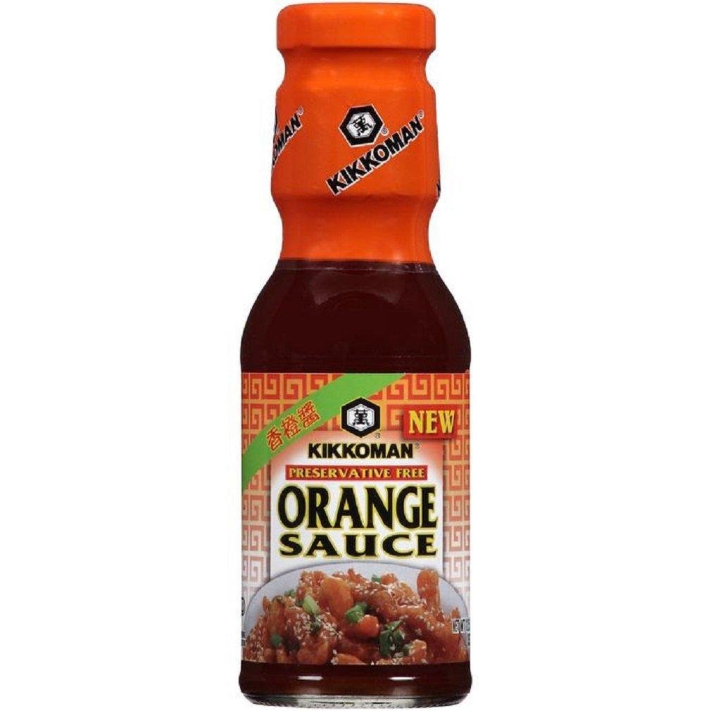 Kikkoman orange sauce bottle pour for a tangy glaze and recipe versatility.