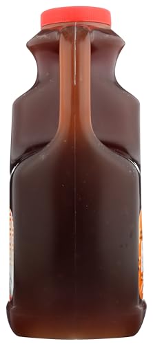Bulk 5lb shelf-ready Kikkoman preservative-free orange sauce in kitchen setting