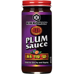 Kikkoman Plum Sauce bottle close-up showing a sweet-tangy glaze for dipping.
