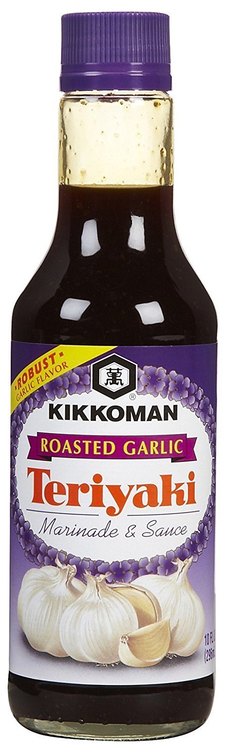 Kikkoman Roasted Garlic Teriyaki Marinade bottle pour; ideal for quick chicken, beef, or pork marinades.