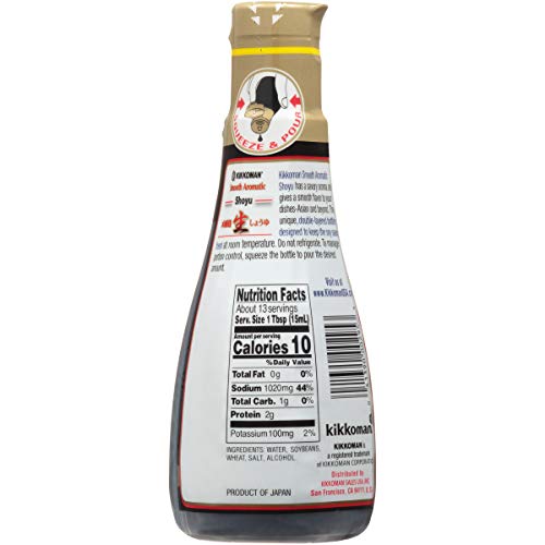 Kikkoman Smooth Aromatic Soy Sauce bright amber color showcases premium Japanese taste.