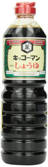 Kikkoman soy sauce bottle, 33.8 oz, versatile all‑purpose seasoning.