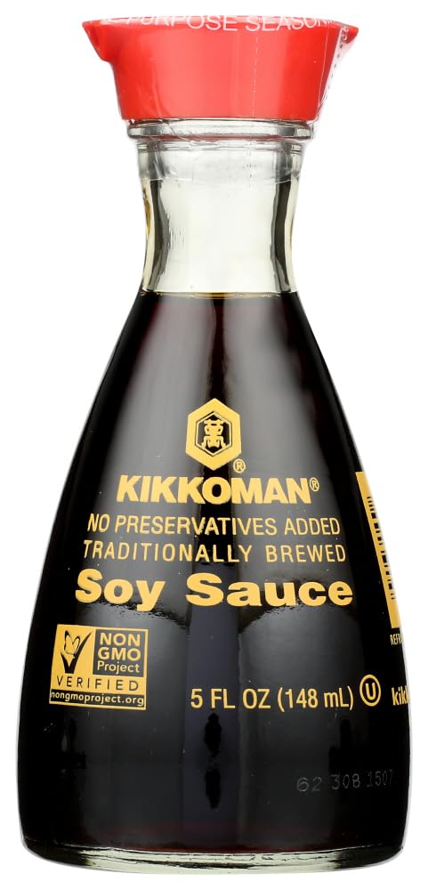 Kikkoman soy sauce dispenser pour demonstrates controlled pouring for mess-free seasoning.