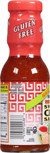 Kikkoman bottle on a kitchen counter ready to glaze vegetables.