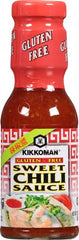 Kikkoman sweet chili sauce glossy texture suggests a quick stir-fry glaze.