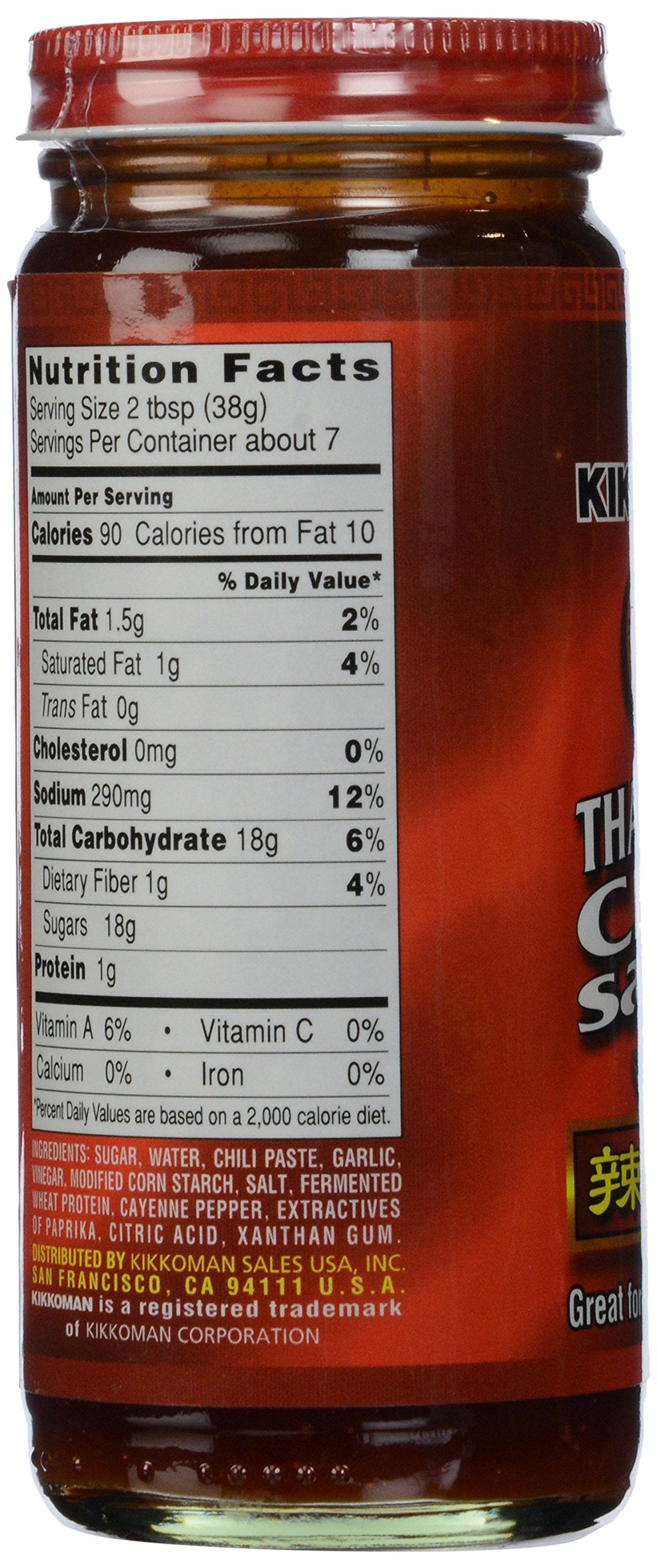 Close-up of Kikkoman Thai Style Chili Sauce bottle with glossy finish