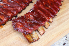 Killer Hogs BBQ Rub on beef steak ready for the grill