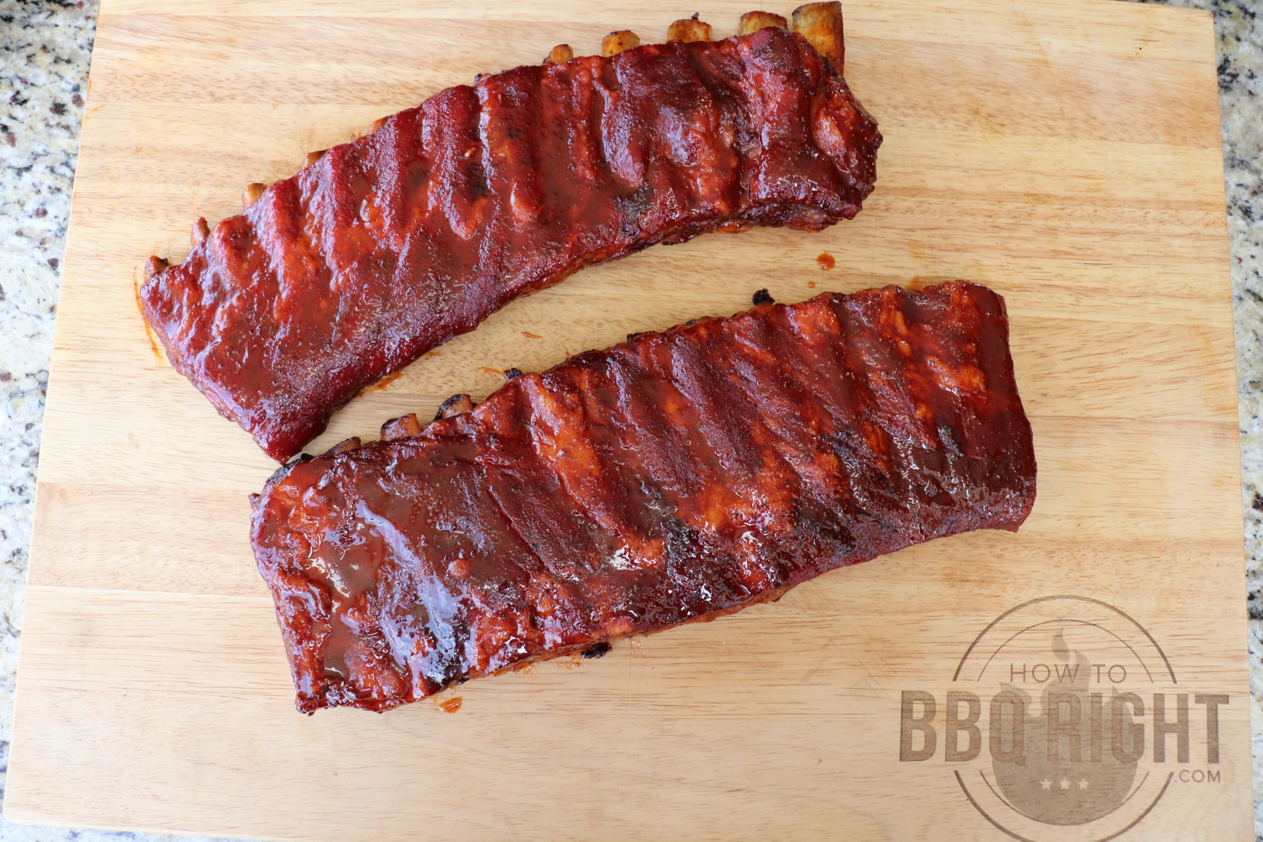 Killer Hogs BBQ sauce pour highlights glossy glaze and even coating.