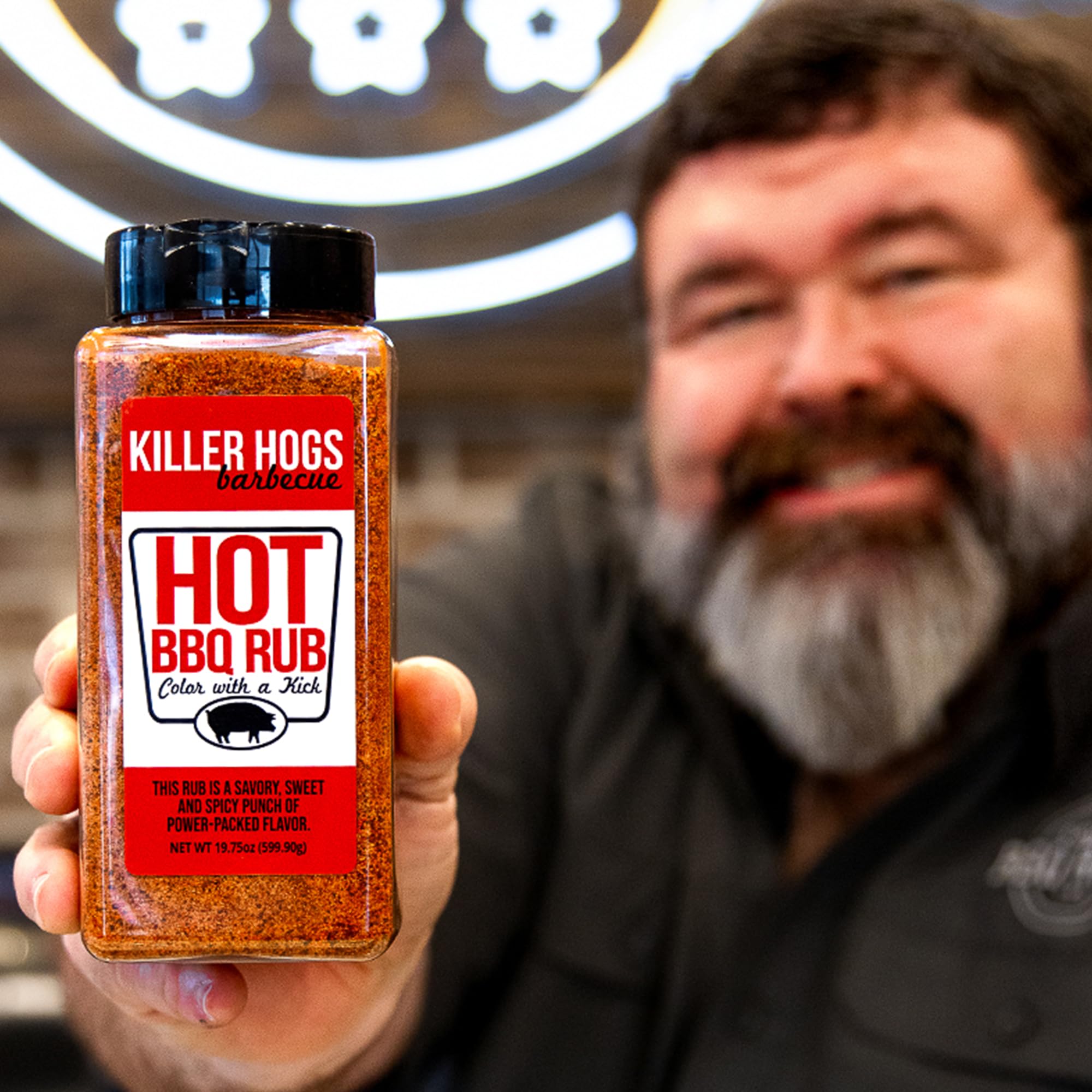 Killer Hogs HOT BBQ Rub on chicken breast for juicy, well-seasoned flavor.