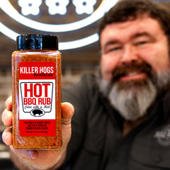 Killer Hogs HOT BBQ Rub on chicken breast for juicy, well-seasoned flavor.