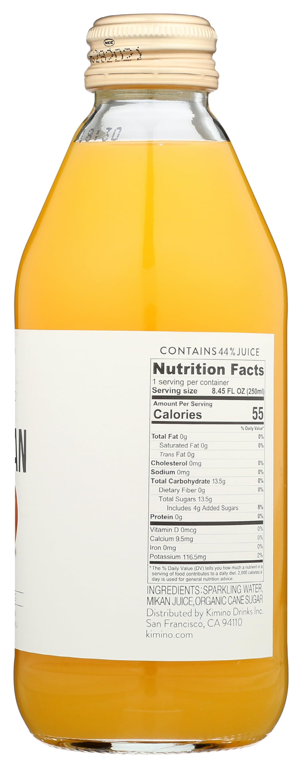 KIMINO Sparkling Mikan Juice pour into a glass for bright mocktails.