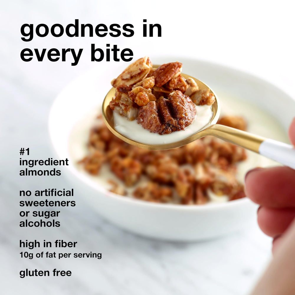 Spoonful of KIND granola with cinnamon and dried fruit aroma.