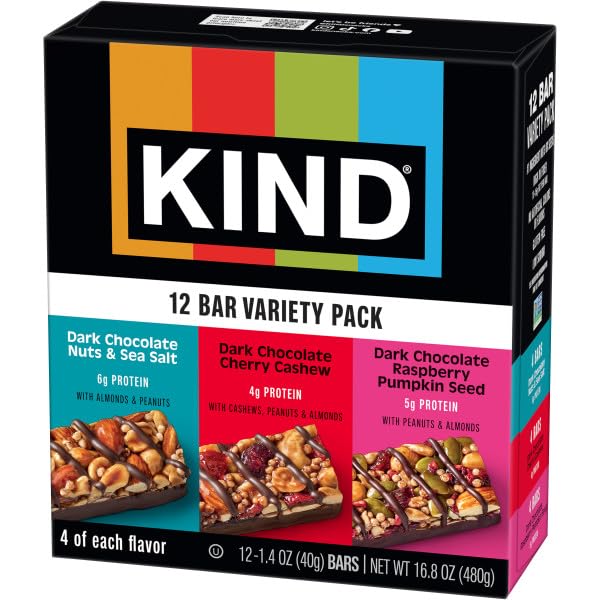 Kind dark chocolate raspberry pumpkin seed bar with pumpkin seed texture.