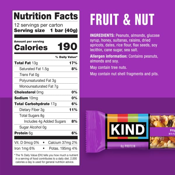 KIND Fruit & Nut bar close-up shows nuts and dried fruit for a nutty bite.